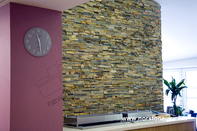 Reception area with Norstone Ochre cladding  feature wall